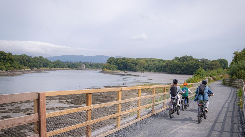 People cycling along the greenway