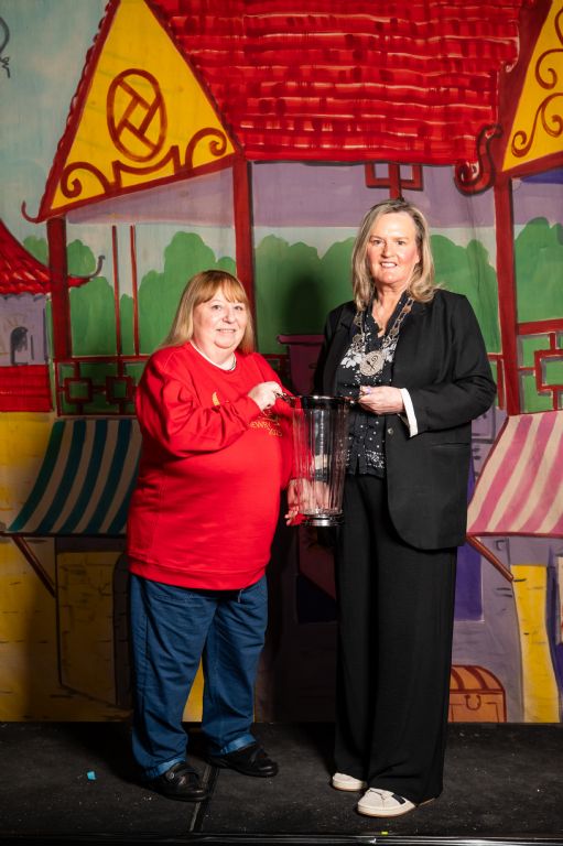 photo 1 deputy chair presents commemorative vase to catherine farrell from newry panto
